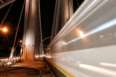 Light trails against sky at night