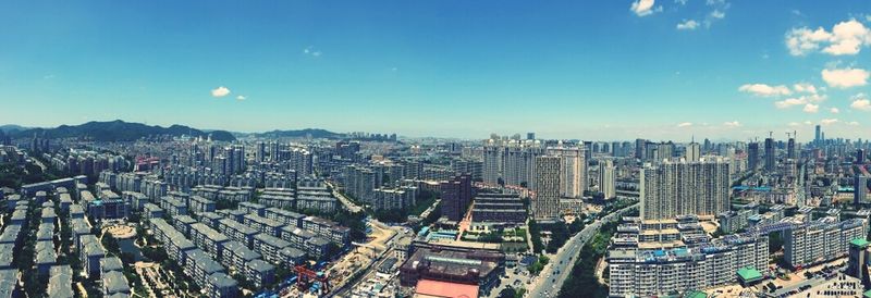 Cityscape against blue sky