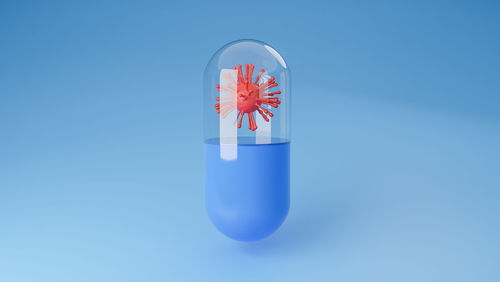 Close-up of drink against blue background