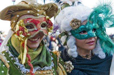 Close-up portrait of woman wearing mask during carnival