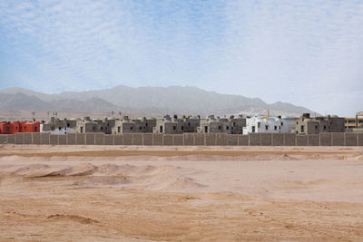 Scenic view of desert against sky