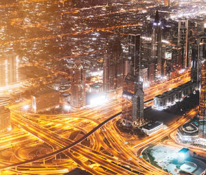 High angle view of illuminated cityscape at night