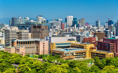 Cityscape against clear sky