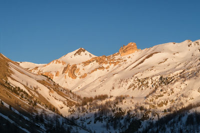 Scenic view of mountains against clear sky