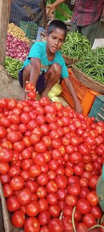 Full length of woman at market stall