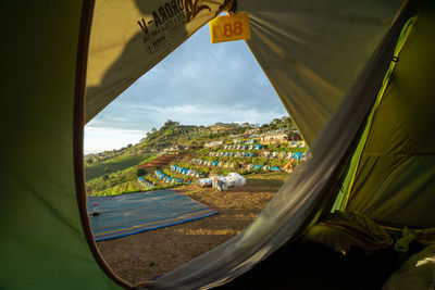 Scenic view of landscape seen through window