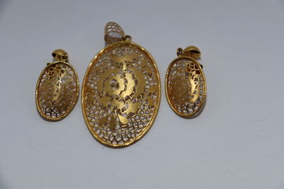 Close-up of coins on white background