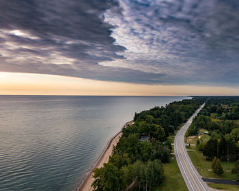 High angle view of sea against sky during sunset
