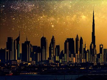 Panoramic view of cityscape against sky during sunset