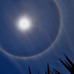 Low angle view of rainbow in sky