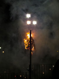 Low angle view of illuminated street light