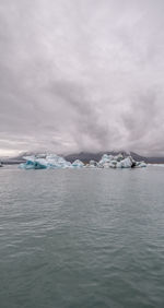 Scenic view of frozen sea against sky