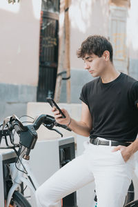 Side view of man riding bicycle