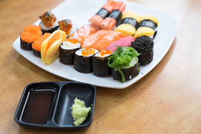 Close-up of sushi in plate on table