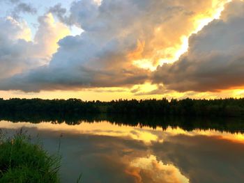 Scenic view of lake against sky during sunset