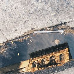 High angle view of damaged wall