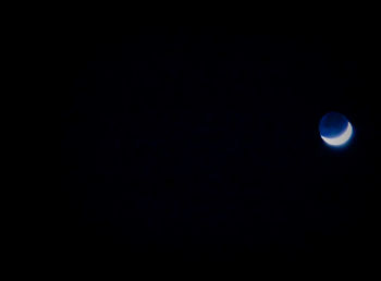 Low angle view of moon at night