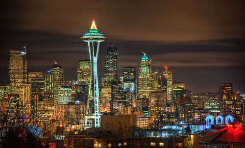 Illuminated buildings in city at night