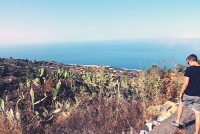 Scenic view of calm sea against clear sky