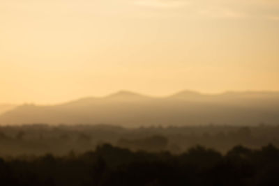 Scenic view of silhouette landscape against sky during sunset