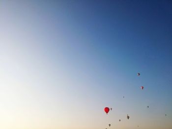 Low angle view of hot air balloon against clear sky