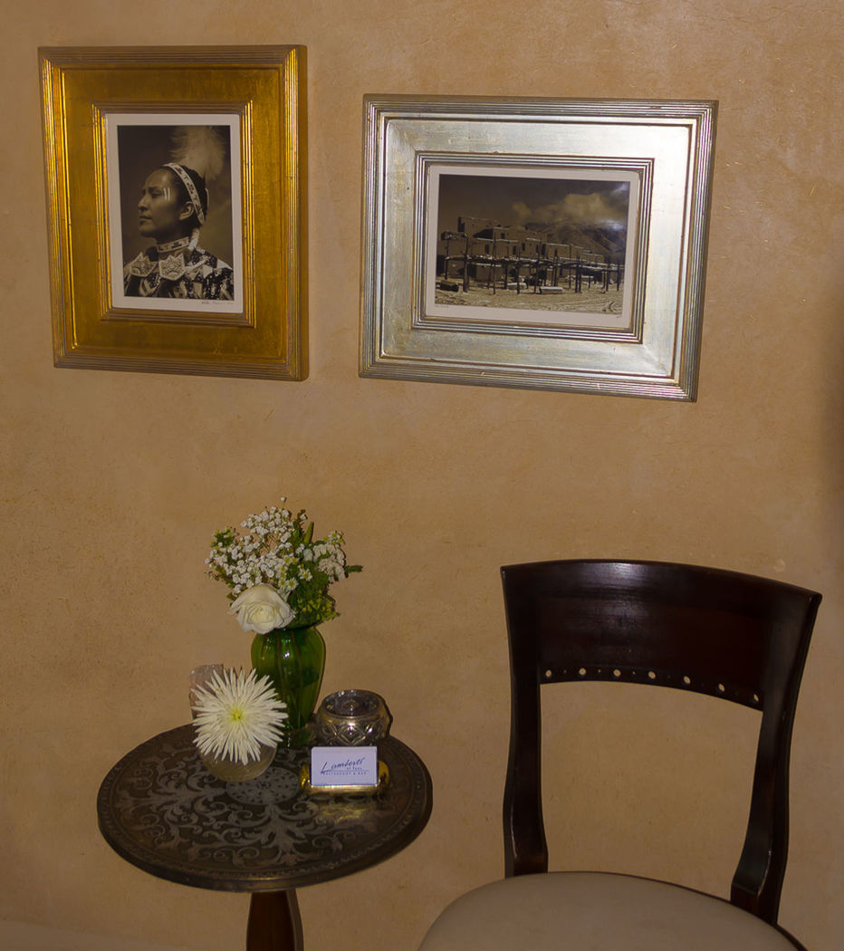 POTTED PLANT ON TABLE AGAINST WALL