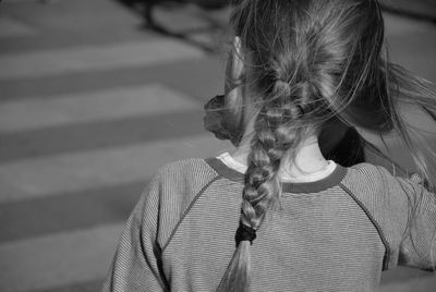 Portrait of young woman standing outdoors