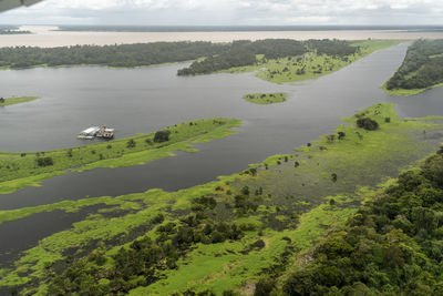 Beautiful aerial view to green flooded rainforest and river