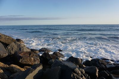 Scenic view of sea against clear sky