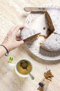 High angle view of woman preparing food on table