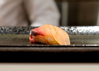Close-up of sushi served on table