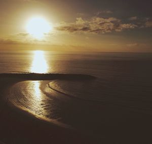 Scenic view of sea at sunset