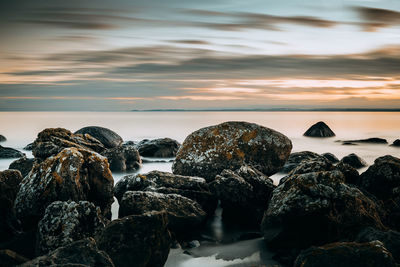 Scenic view of sea against sky during sunset