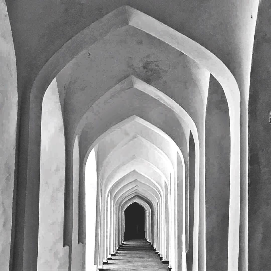 arch, architecture, built structure, the way forward, architectural column, direction, arcade, diminishing perspective, in a row, no people, indoors, corridor, day, colonnade, building, empty, repetition, the past, history, vanishing point, ceiling, underneath, long, arched