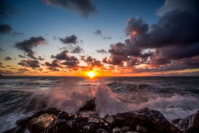 Scenic view of sea against sky during sunset