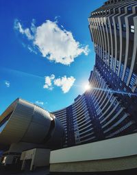 Low angle view of modern buildings against sky