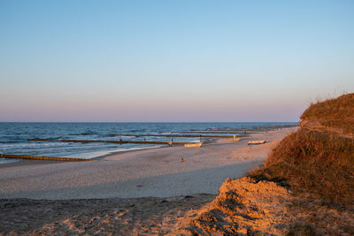 Scenic view of sea against clear sky