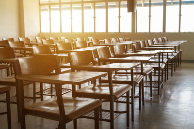 Empty chairs and table in restaurant