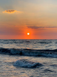 Scenic view of sea against sky during sunset