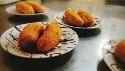 Close-up of food in plate on table