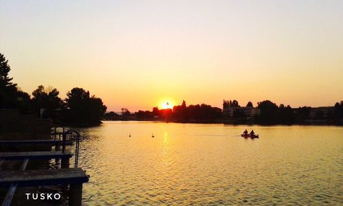 Scenic view of sunset over calm sea