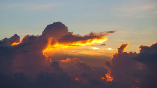 Low angle view of dramatic sky during sunset