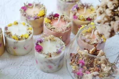 Close-up of scented candles on table