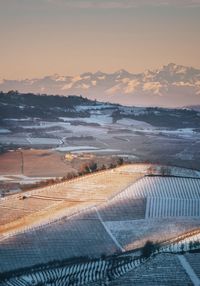 Scenic view of landscape against sky during sunset