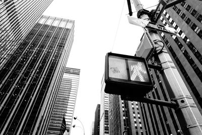Low angle view of skyscrapers against sky