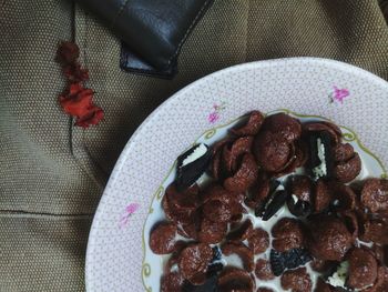 High angle view of fruits in plate on table