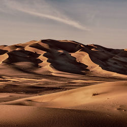 Scenic view of desert against sky