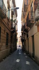 Street amidst residential buildings