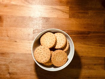 High angle view of cookies on wooden table