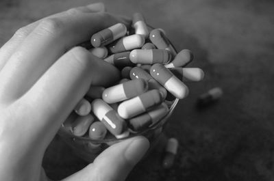 Close-up of person holding hands